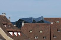 Blick über die Dächer der Stadt mit neuem Dachaufbau des Museums der Kulturen